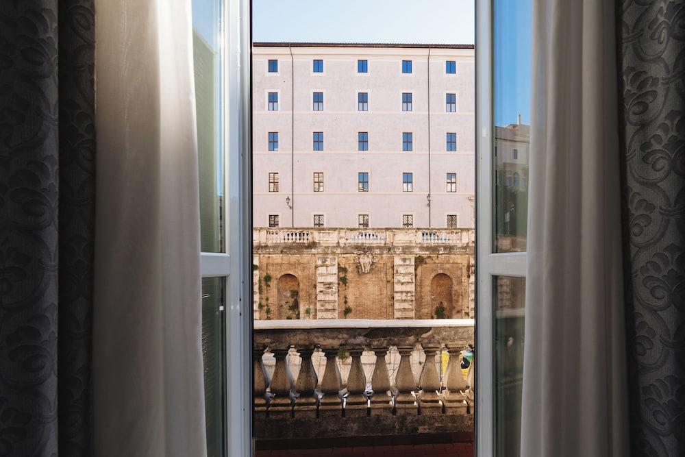Hotel Centro Cavour - Tap to explore photos