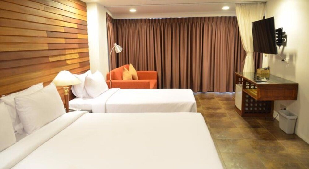 Nanda Heritage Hotel Room Type - Deluxe Triple Room