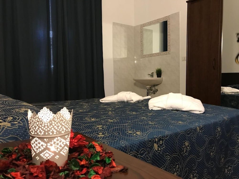 Locanda Otello Room Type - Economy Triple Room, Shared Bathroom Locanda Otello Room Type - Economy Triple Room, Shared Bathroom