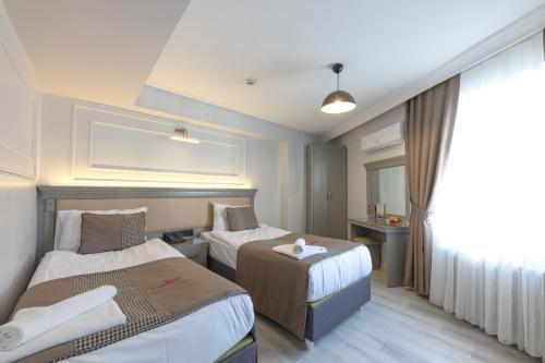 Kuran Hotel International Room Type - Standard Double or Twin Room