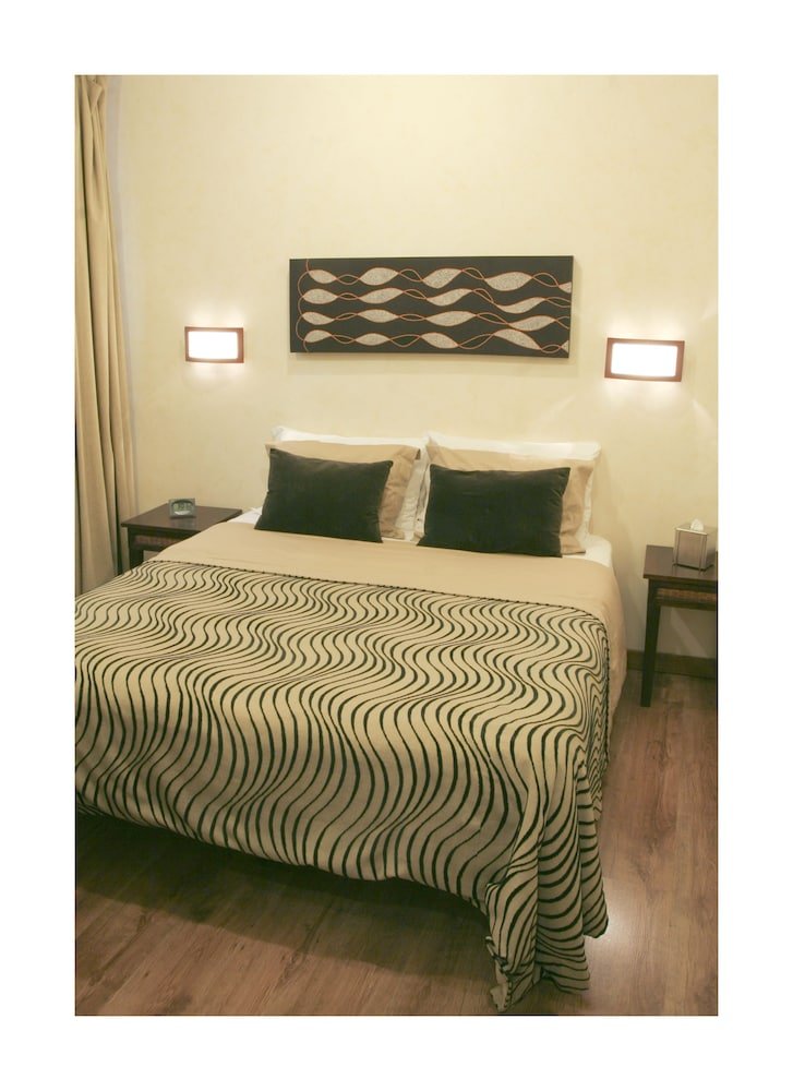 Daphne Luxury Suites - Tap to explore photos