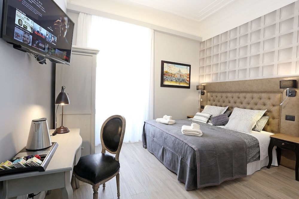 Capricci Romani Room Type - Deluxe Triple Room, 1 Bedroom, Refrigerator Capricci Romani Room Type - Deluxe Triple Room, 1 Bedroom, Refrigerator