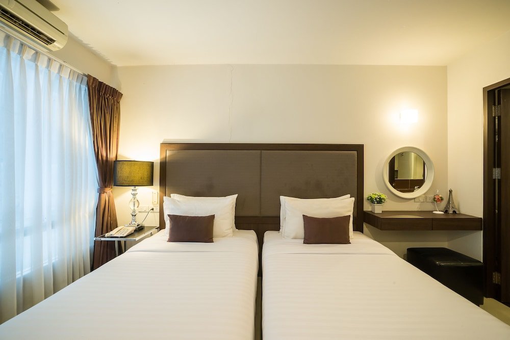Beyond Suite Hotel - Tap to explore photos
