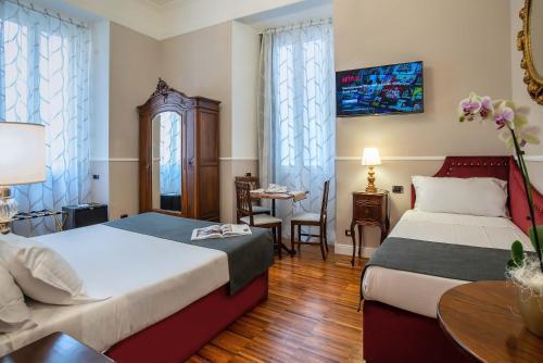 I TRE MOSCHETTIERI - D'ARTAGNAN Luxury Guest House - Tap to explore photos