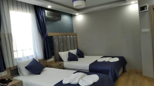 Yesilpark Hotel Room Type - Quadruple Room with Balcony Yesilpark Hotel Room Type - Quadruple Room with Balcony