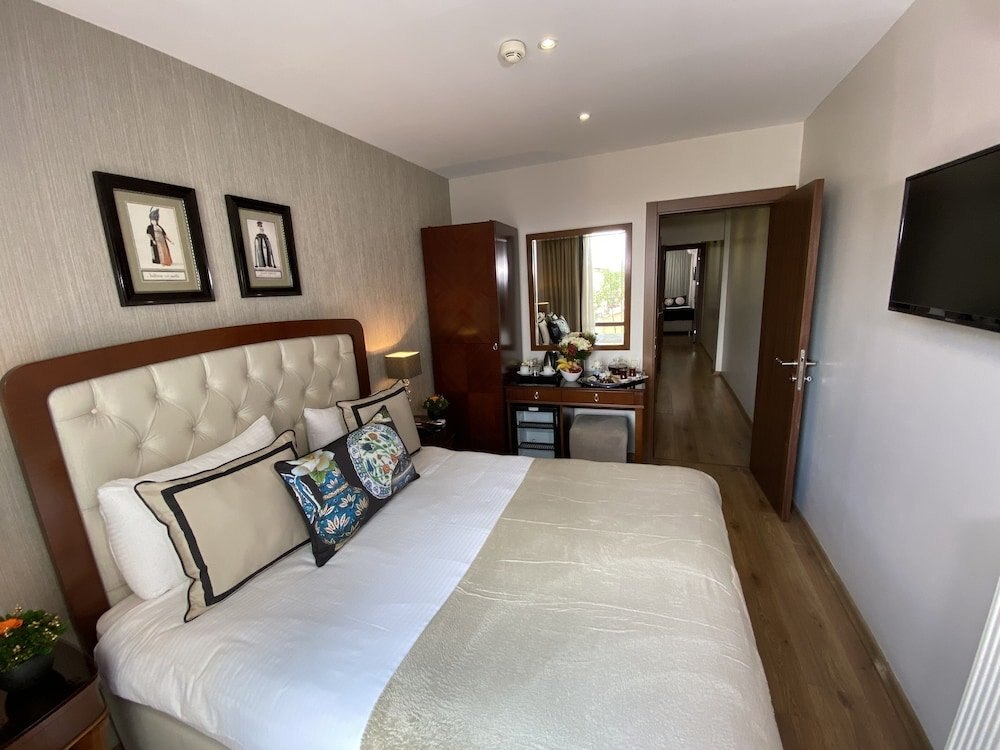 Four Doors Hotel Room Type - Deluxe Family Triple Room, 2 Bedrooms Sea View