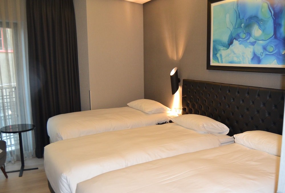 Barbera Hotel Room Type - Deluxe Triple Room, 3 Twin Beds