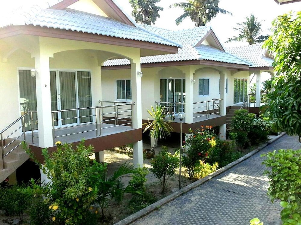 Krisada Beach Resort - Tap to explore photos