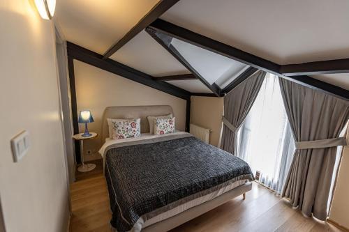 Calanthe Residence Room Type - Luxury Triple Room Calanthe Residence Room Type - Luxury Triple Room
