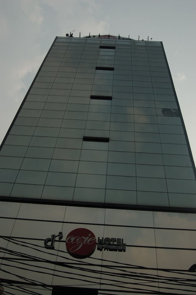 D'Cozie Hotel by Prasanthi - Tap to explore photos