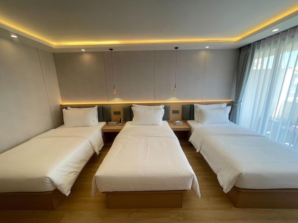 All Together Suite Room Type - Deluxe Triple Room