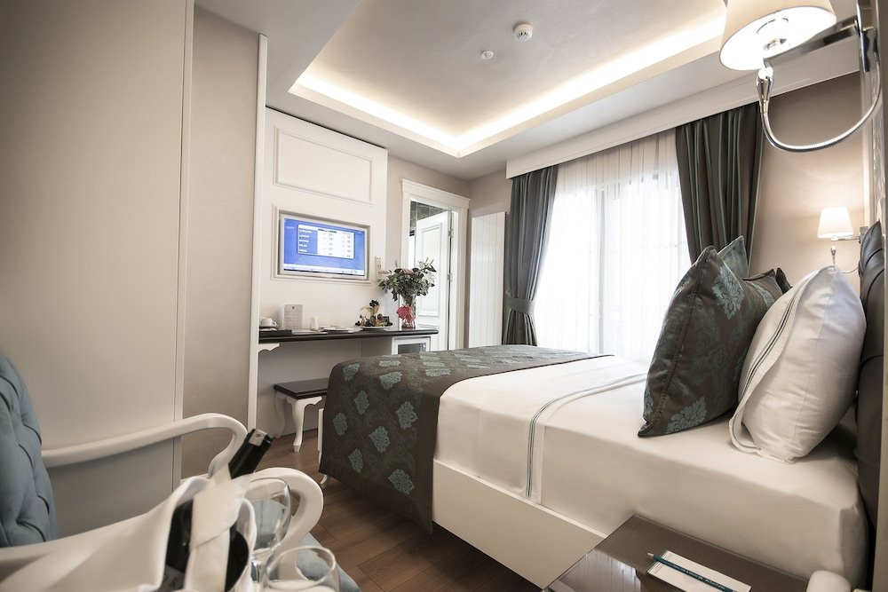Antusa Palace Hotel & Spa Room Type - Connecting Family Room Antusa Palace Hotel & Spa Room Type - Connecting Family Room