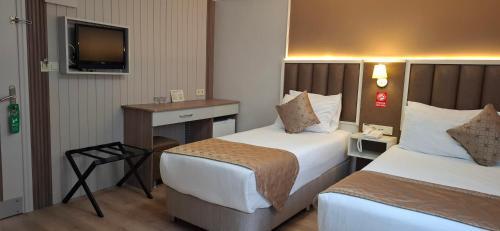 Hotel Sureyya Room Type - Triple Room Hotel Sureyya Room Type - Triple Room