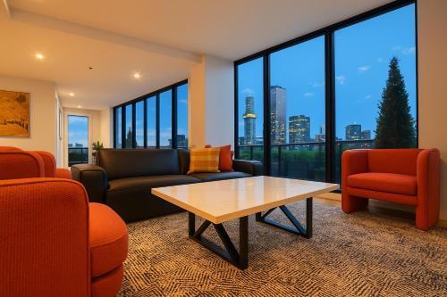 Aura on Flinders Serviced Apartments - Tap to explore photos