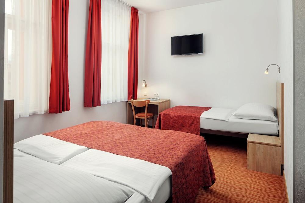 Hotel Ambiance Room Type - Standard Triple Room (Double with Extra bed) Hotel Ambiance Room Type - Standard Triple Room (Double with Extra bed)