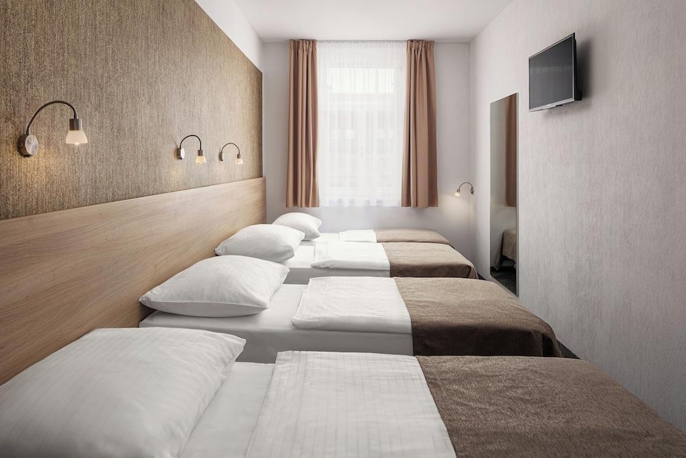 Hotel Ambiance Room Type - Standard Quadruple Room (Triple with Extra bed)