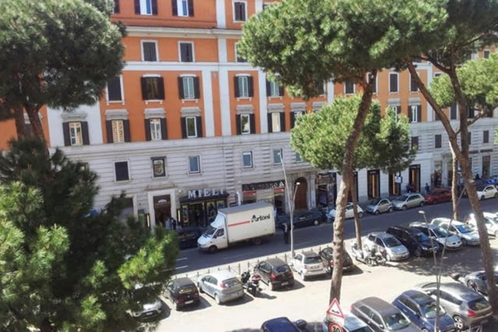 Vacanze Romane Rooms - Tap to explore photos