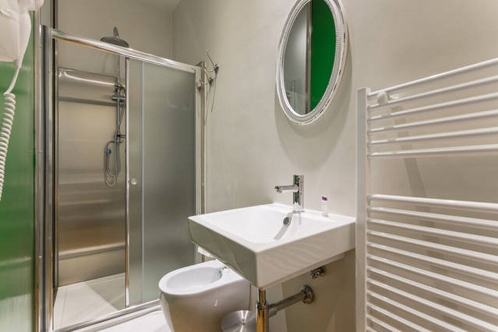 Vacanze Romane Rooms - Tap to explore photos