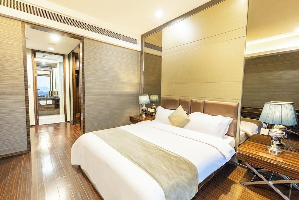 Xingyi International Hotel Poly Store - Tap to explore photos