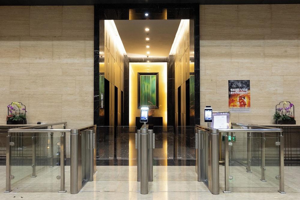 Xingyi International Hotel Poly Store - Tap to explore photos