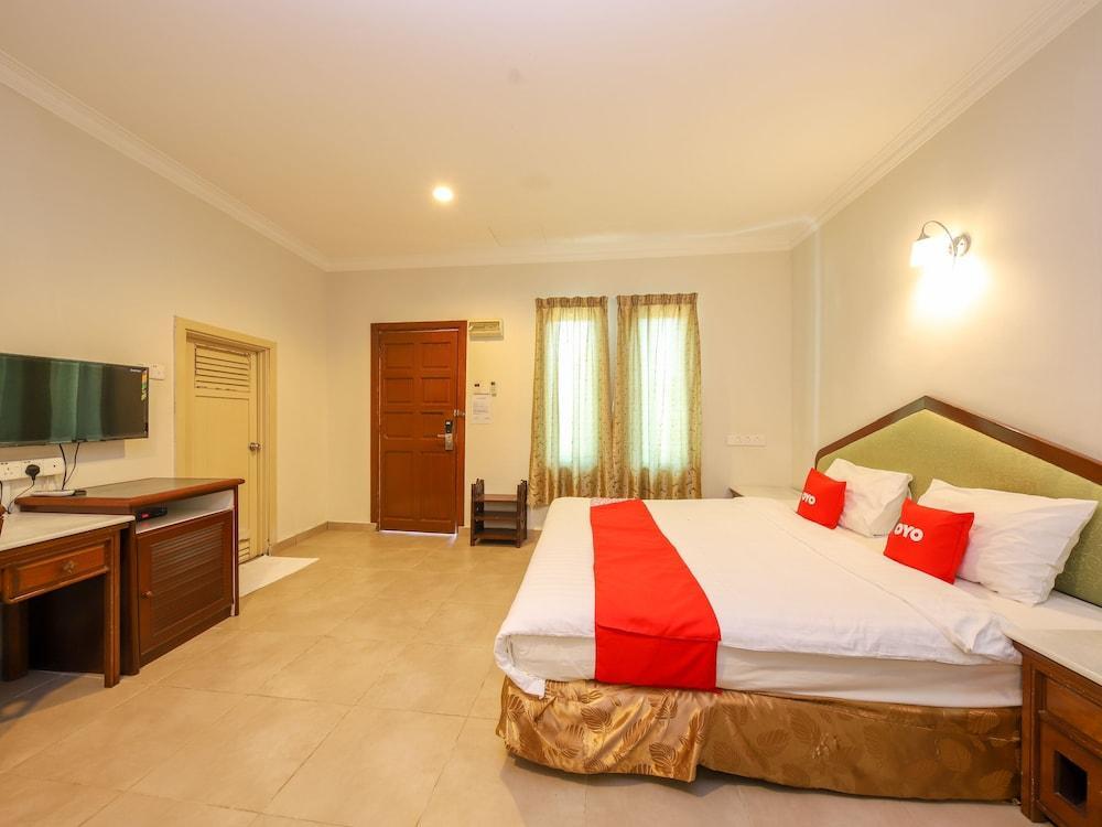 OYO 89679 Dream Garden Resort - Tap to explore photos