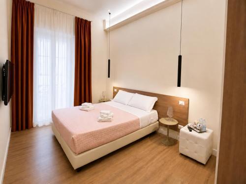 Roma In Una Stanza Guesthouse - Tap to explore photos