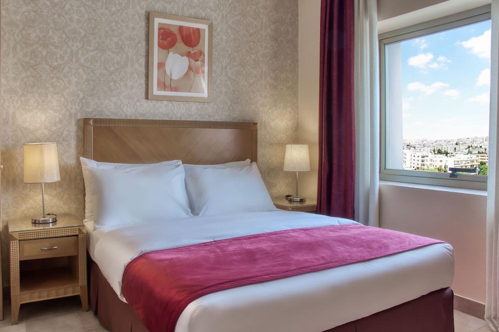 Geneva Hotel Amman Room Type - Family Connecting Rooms - Double & Twin beds Geneva Hotel Amman Room Type - Family Connecting Rooms - Double & Twin beds