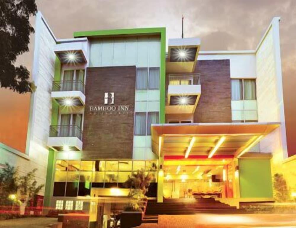 Bamboo Inn Hotel & Cafe - Tap to explore photos