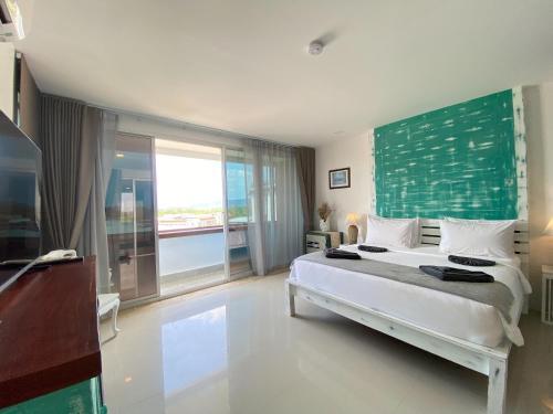 Baan Bandalay Hotel - Tap to explore photos