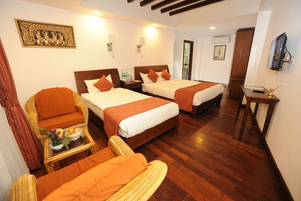 Apsara Boutique Hotel Room Type - Deluxe triple room with garden View