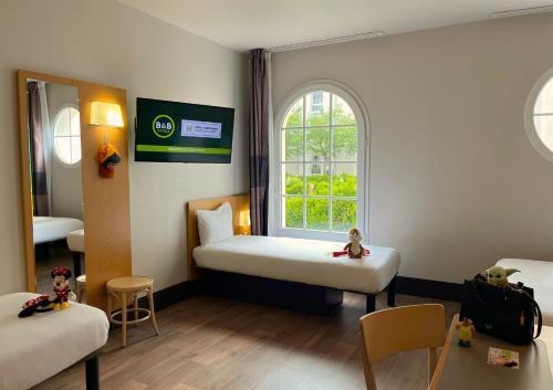 B&B HOTEL près de Disneyland® Paris - Tap to explore photos