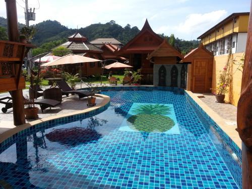 Golden Teak Resort Baan Sapparot - Tap to explore photos