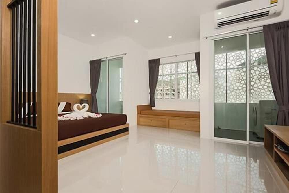 M.U.DEN Patong Phuket Hotel - Tap to explore photos
