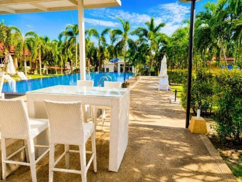 Phuket Airport Villa - Tap to explore photos