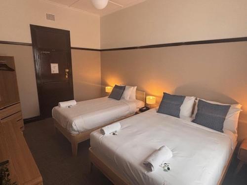 Strathfield Hotel Room Type - Queen + King Single Shared Bathroom