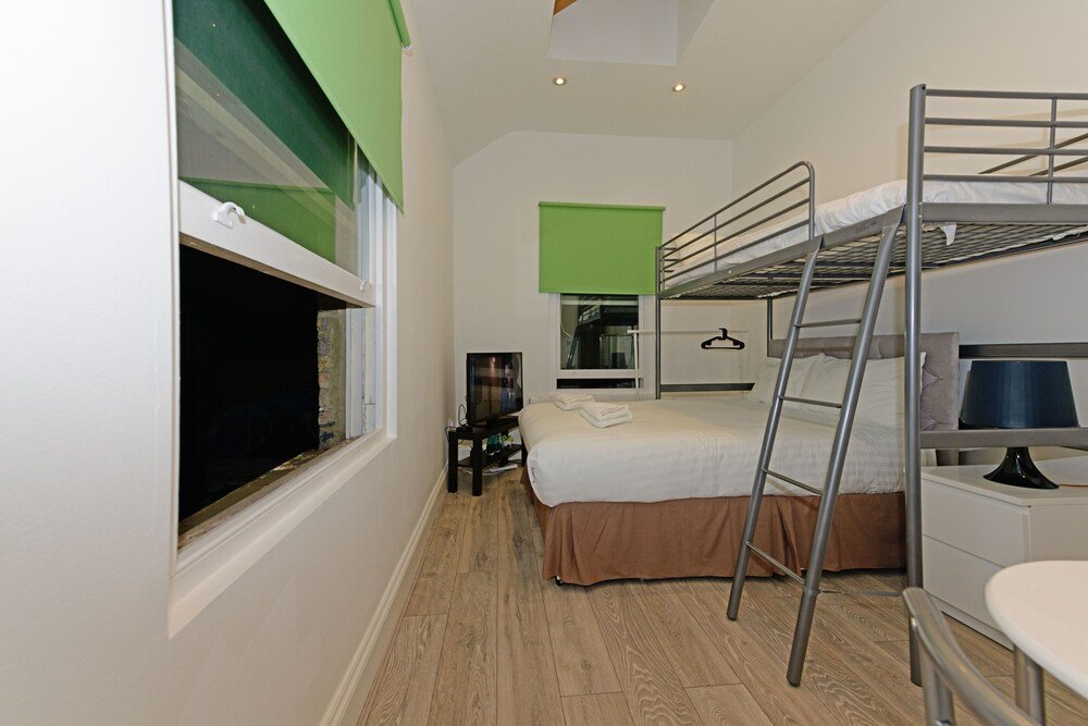 Grand Apartments Fulham Palace - Tap to explore photos