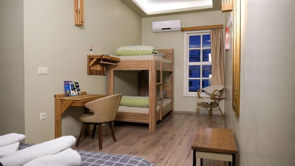 Second Home Hostel Room Type - Deluxe Triple Room, Private Bathroom