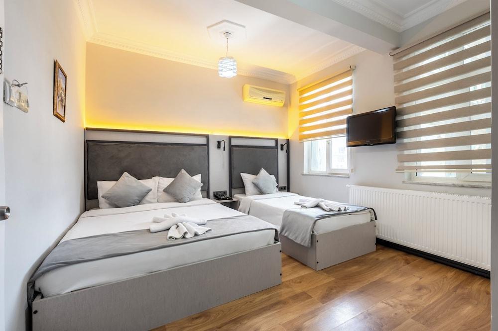 Taksim Trust Hotel Room Type - Standard Quadruple Room Taksim Trust Hotel Room Type - Standard Quadruple Room
