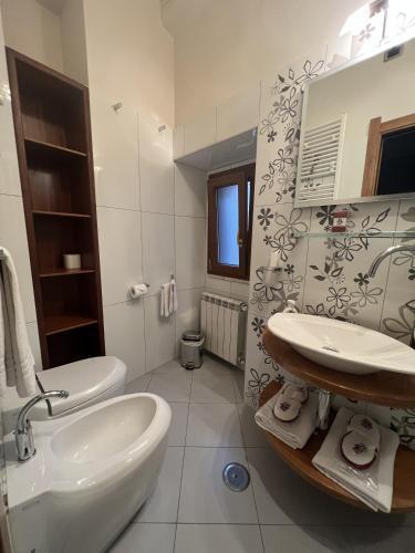 Condotti Rooms - Tap to explore photos
