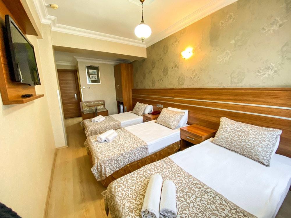 Hotel Mekke Room Type - Triple Room