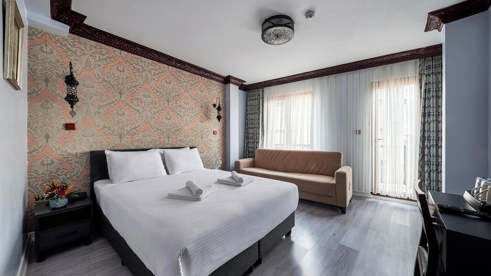 Mytra Hotel Room Type - Deluxe Triple Room Mytra Hotel Room Type - Deluxe Triple Room