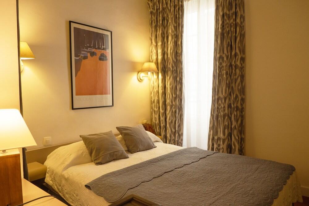Hotel du Cygne Paris - Tap to explore photos