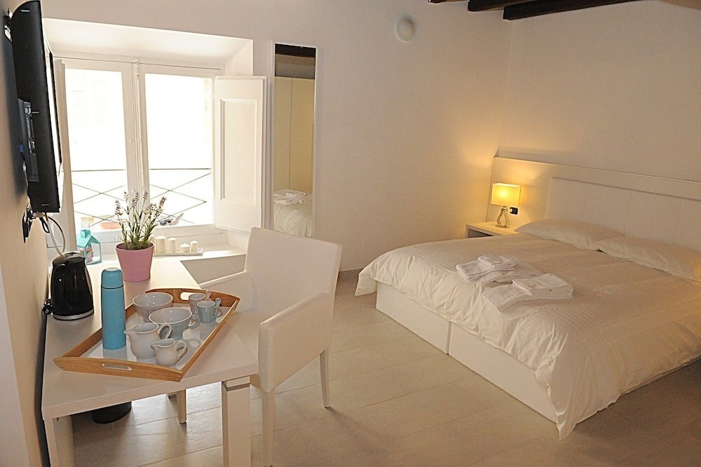 Flowers Apartments Room Type - Quadruple Room (Biscione) Flowers Apartments Room Type - Quadruple Room (Biscione)