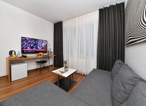 Nish Suites Atasehir - Tap to explore photos
