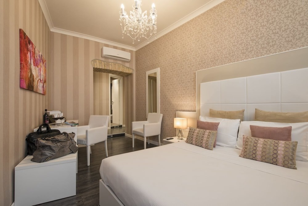 San Pietro Suites - Tap to explore photos