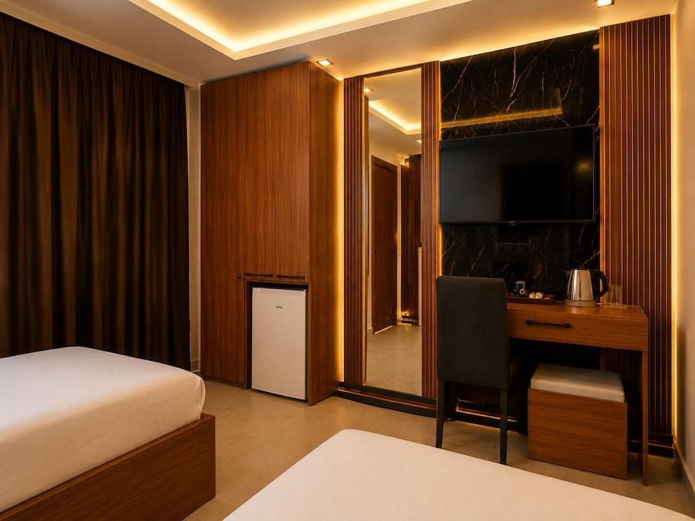 Palmiye Suit Room Type - Deluxe Triple Room, City View