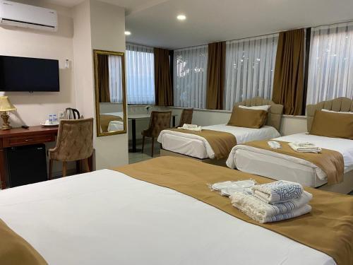 Atam Suites & Apart Room Type - Quadruple Room with Sea View