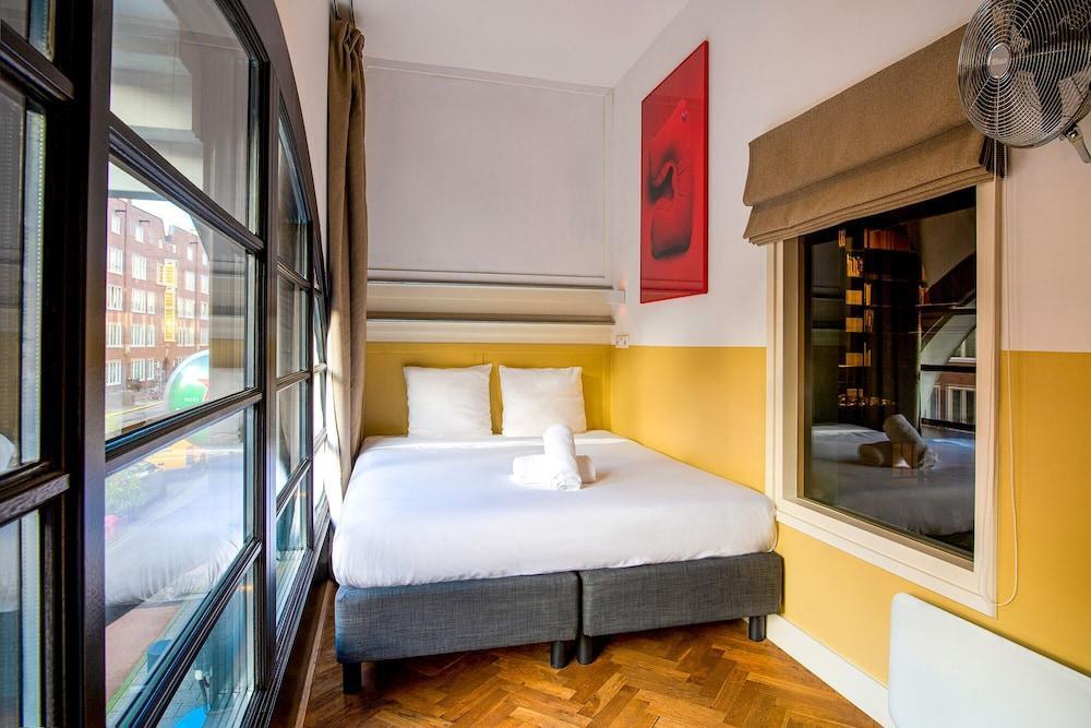 Hotel Not Hotel Amsterdam Room Type - Simple double room, shared bathroom (Secret Bookcase Whitey the White) Hotel Not Hotel Amsterdam Room Type - Simple double room, shared bathroom (Secret Bookcase Whitey the White)