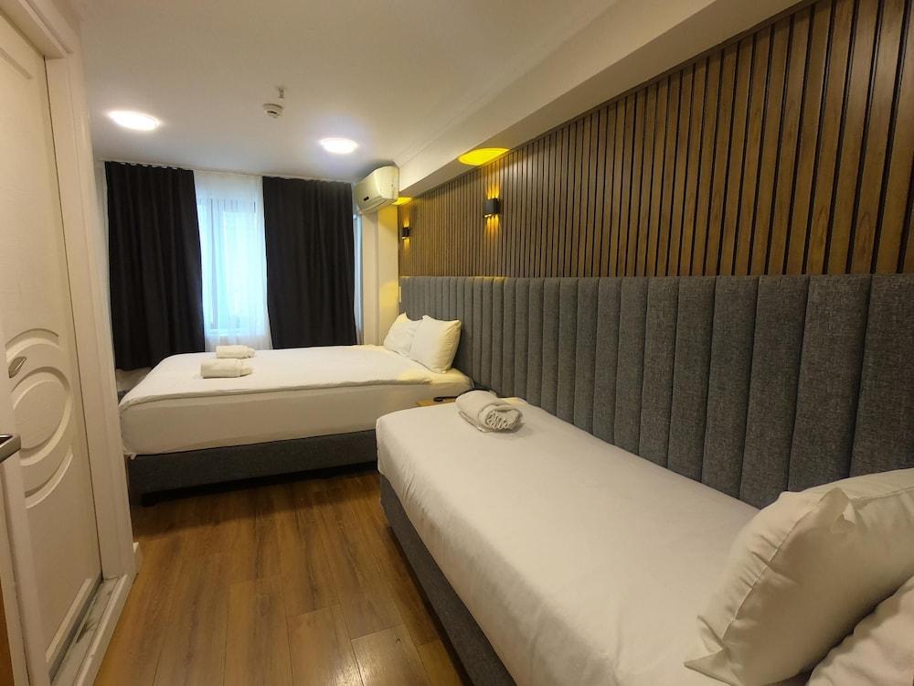 Naila Hotel Room Type - Deluxe Twin Room Naila Hotel Room Type - Deluxe Twin Room