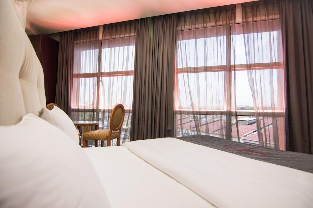 Suwara Hotel - Tap to explore photos